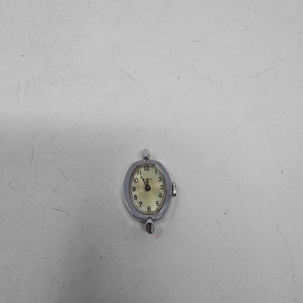 Vintage Timex Womens Oval Watch Face Silver Tone Chrome Plated Base Metal Bezel